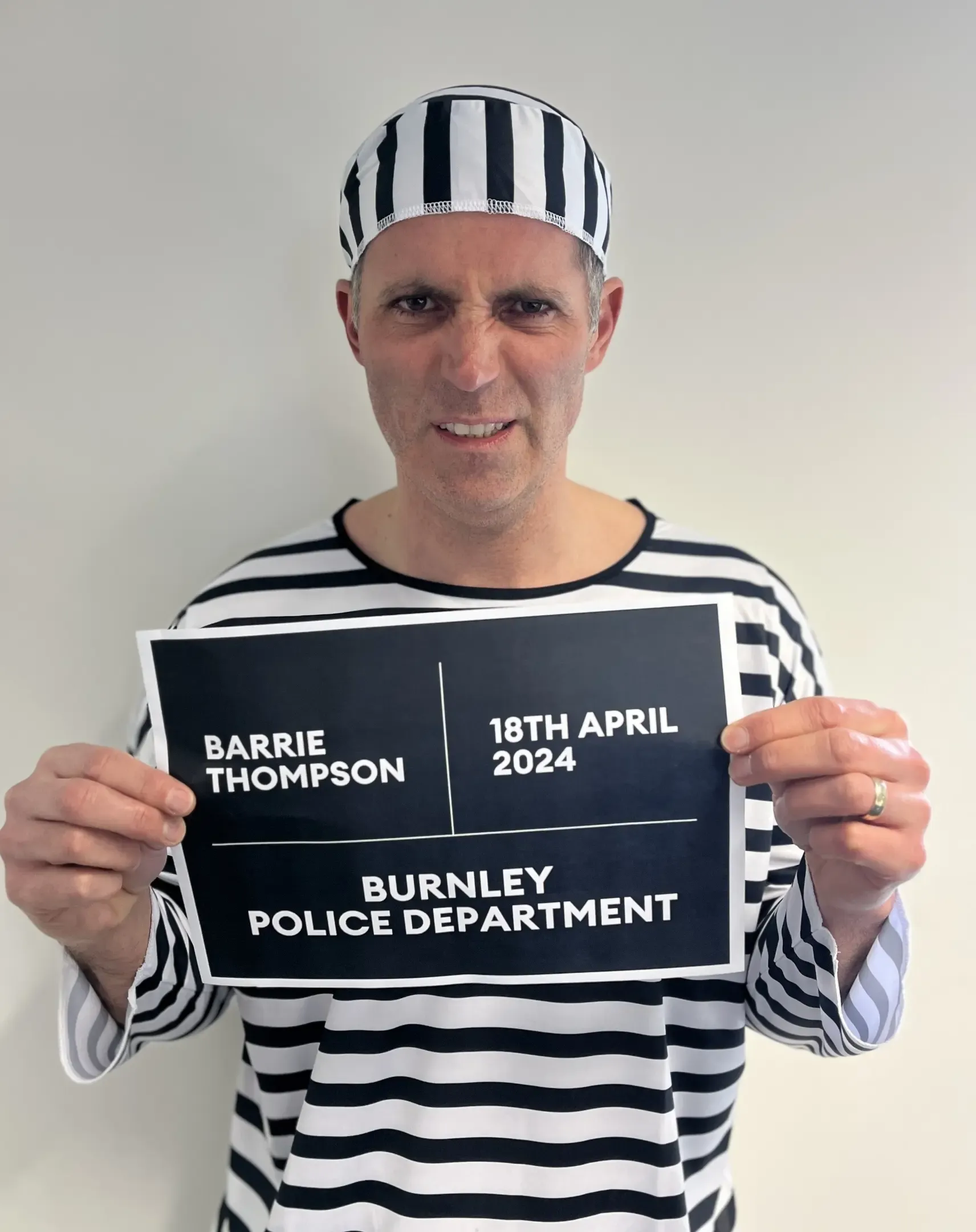 Barrie dressed as a prisoner for fundraising