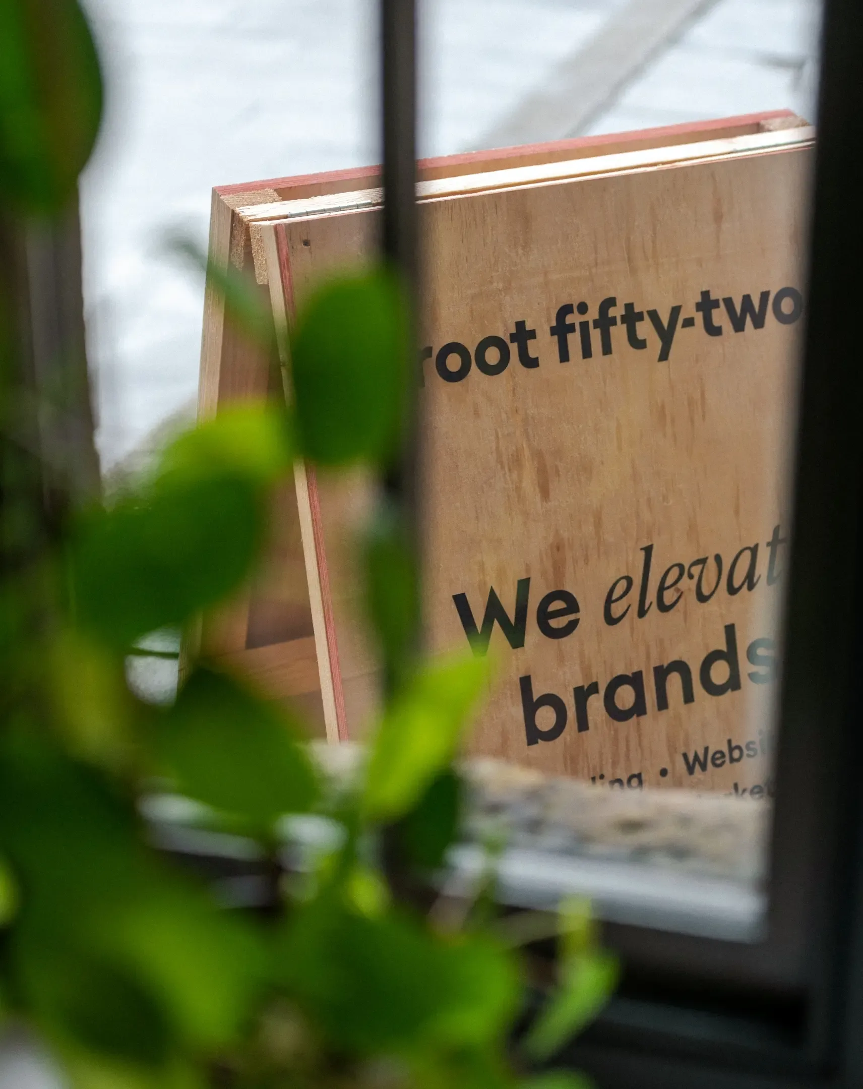 The Root Fifty Two sign outside