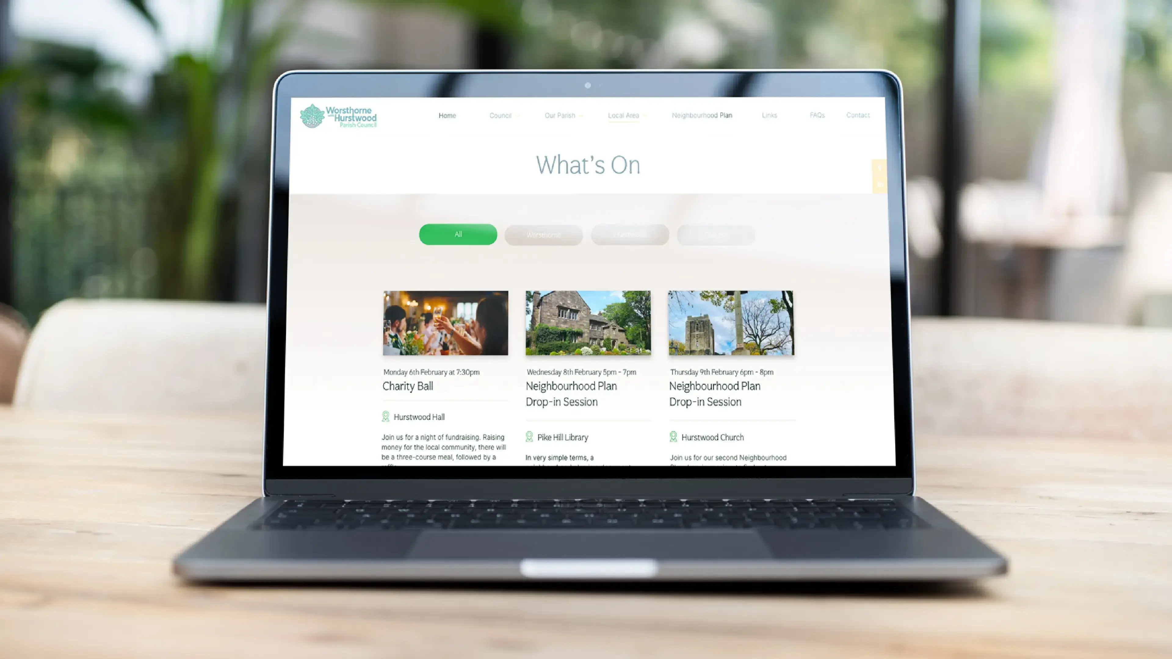 A shot of the website on a laptop