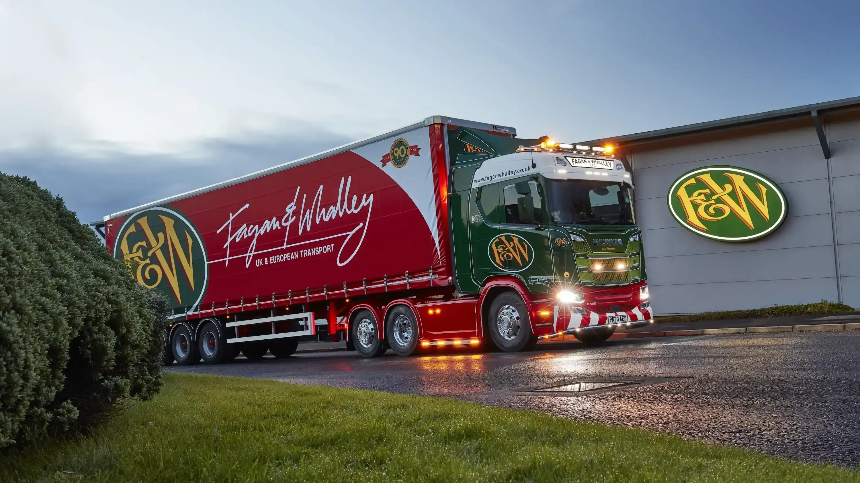 A fagan & whalley truck outside a warehouse